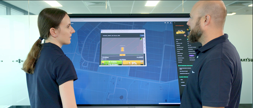 Smart Construction Support Centre experts working in front of a screen